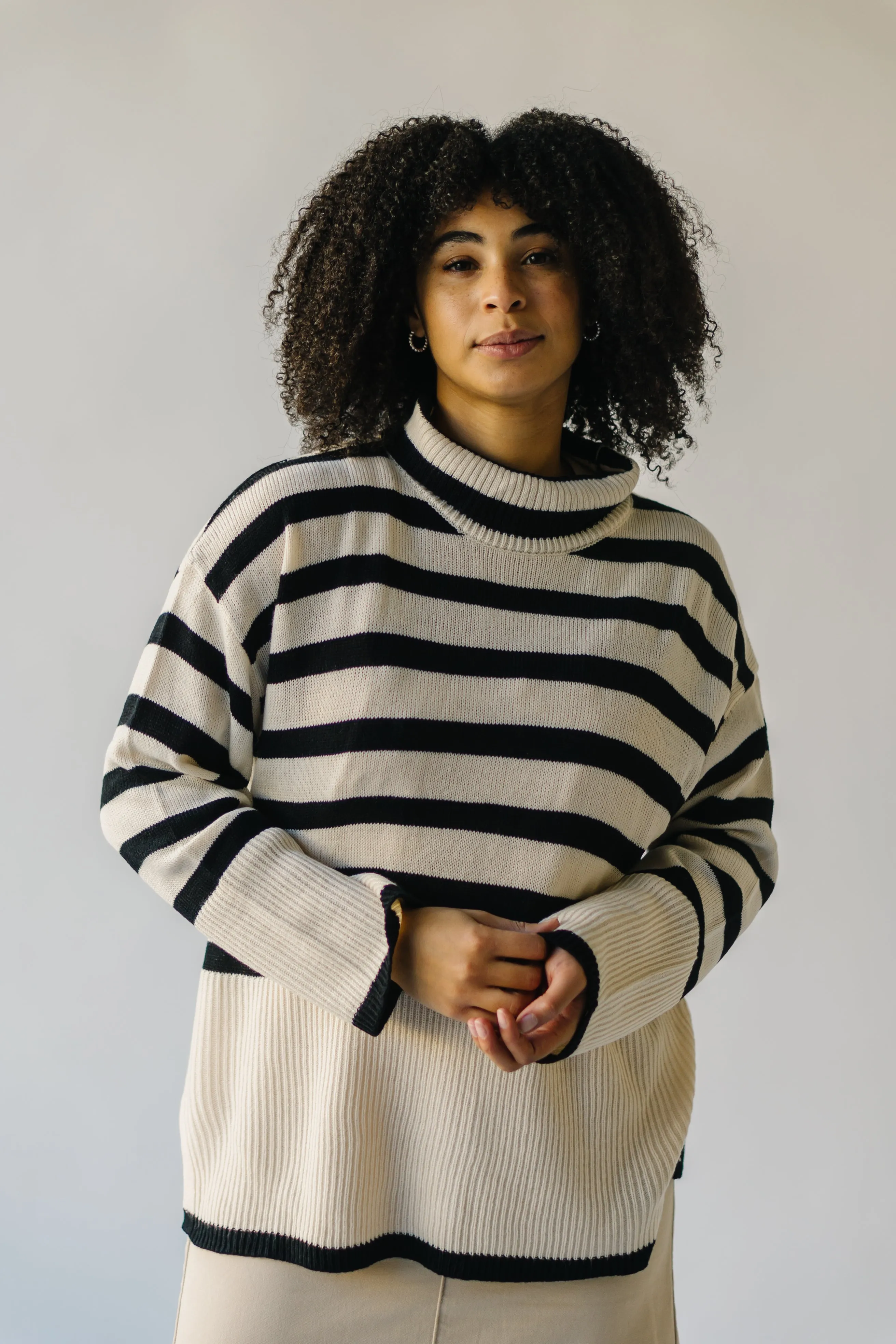 The Bryson Striped Turtleneck Sweater in Cream + Black